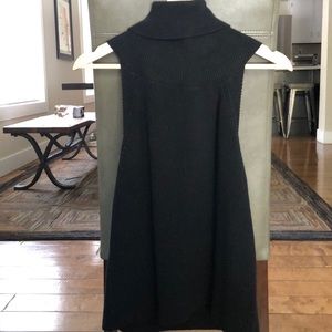 Open back, turtleneck sweater!